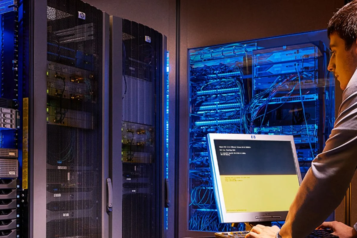 OMNIVIR technician providing onsite IT support in a server room